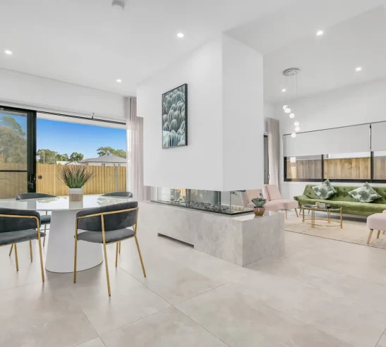 dining area, fireplace and living room